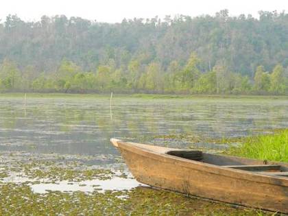 A boat among the water plants at Chandubi
