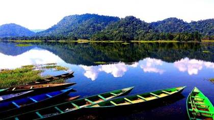 Boats moored on Chandubi Lake