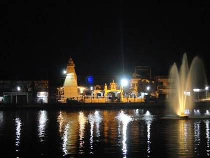 Kali Dighi and its temple at night