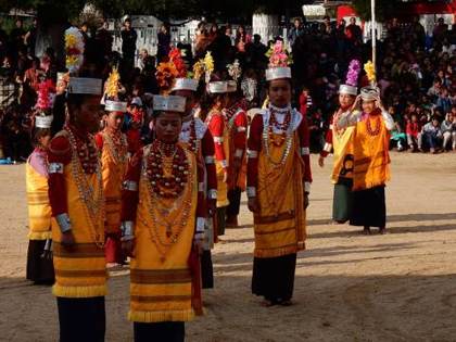 Young women in gold and silver crowns