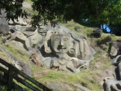 Rock-cut faces at Unakoti
