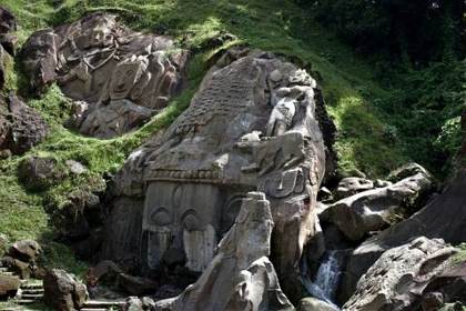 The carved hillside at Unakoti